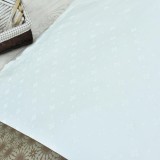 detaliu_material_satin_luxos_escala_textura_fina_si_lucioasa